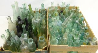 Collection of vintage glass bottles including Old Crans Special Toddy, Tadcaster Tower Brewery,