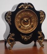 19th century cartouche shaped mantle clock, ebonised case with gilt metal leaf mounts,
