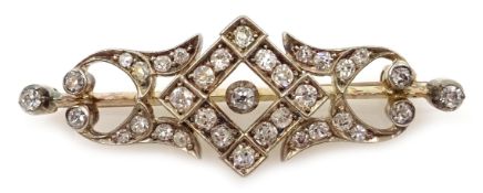 Gold and silver diamond bar brooch Condition Report Approx 5.5gm, length = 4.