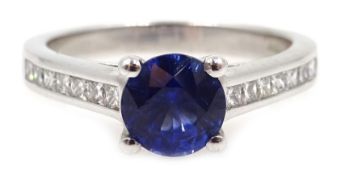 White gold single stone round sapphire ring with diamond set shoulders, hallmarked 18ct,