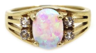 Gold opal and white topaz ring, hallmarked 9ct Condition Report Approx 3.