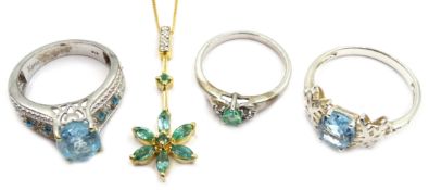 Silver-gilt green stone set flower pendant, similar ring and blue stone set rings,