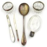 Silver table spoon, ladies cut glass hip flask, pair cut glass salts with silver rims,