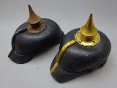 Two German leather Picklehaube helmets with brass spikes and adjustable leather liners,