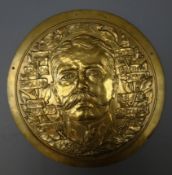 Bronze circular plaque relief decorated with 'Kitchener of Khartoum' surrounded by a laurel wreath