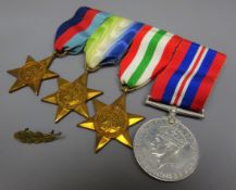 WW2 medal group of four comprising, War Medal, Italy Star, Atlantic Star and 1939-1945 Star,