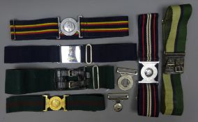 Seven Military Stable Belts with Regimental buckles;