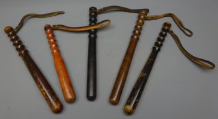 City of London Policewomans turned wooden Truncheon, and four others, with leather wrist straps,