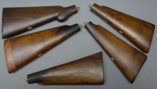 Five walnut gunstocks,