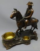 Smoker's stand as a bronzed spelter figure of Napoleon on horseback,