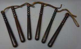 City of London Police turned hardwood Truncheons, variously stamped, with leather wrist straps,