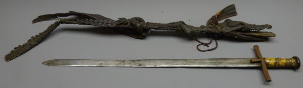 Sudanese Kaskara Sword, 74cm broad double edged part fullered blade engraved with opposing moons,