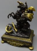 Cast figure of Napoleon with bronze and brass finish depicted on horseback crossing the Alps,