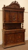 Early 20th century continental carved oak buffet cabinet, raised arched top with carved frieze