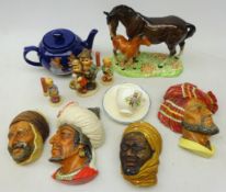 Four Bossons figural wall plaques, Beswick horse and foal group,