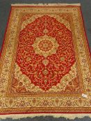 Kashan style red ground rug, repeating border,