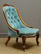 Victorian walnut framed nursing chair upholstered in an aqua blue velvet,