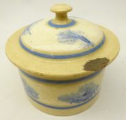 19th century Mochaware jar and cover decorated with bands of stylized seaweed on blue and white