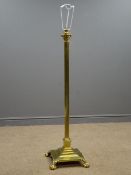 Brass standard lamp, magnolia shade,