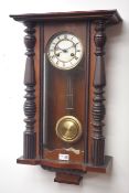Early 20th century walnut cased Vienna wall clock, twin train driven movement striking on coil,