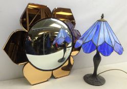 Tiffany style table lamp with flower shaped shade and moulded base,