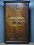Large 18th century oak corner cabinet, two double cupboards enclosed by panelled doors,