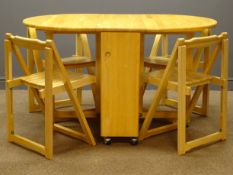 Beech drop leaf table with gate action supports with four chairs which store under the table,