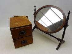 Naive two drawer table top box, D30cm x H27cm and an Edwardian oval mahogany frame swing mirror,