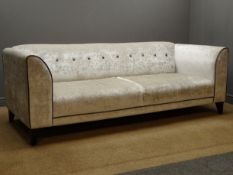 Four seat DFS sofa upholstered in cream fabric with dark grey trim (W227cm),