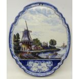 Large 19th century Delft Polychrome wall plaque of shaped form painted with figures,