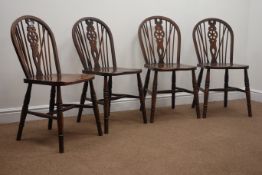 Late 20th century set four elm and beech wheel back chairs Condition Report <a