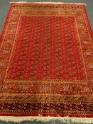 Bokhara style red ground rug/wall hanging,