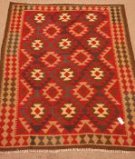 Maimana Kelim brown ground rug, geometric pattern field,