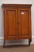 Early 20th century oak wall cupboard, two panelled doors enclosing two shelves, W44cm,