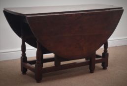 18th century oak dining table, oval drop leaf top, gate-leg action base,