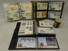 Collection of FDCs in four albums including; Royalty, Christmas, Commemorative, Caicos Islands,