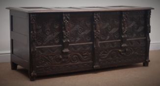 18th century heavily carved oak blanket chest, four panel hinged lid,