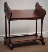 Early 20th century Irish walnut book trough, sloped top tier with relief carved ends,