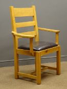 Light oak ladder back carver armchair, upholstered drop in seat,