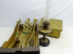 Victorian brass oil lamp on ceramic base,