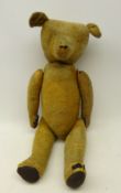 Large early 20th Century straw-filled mohair teddy bear with hump back,