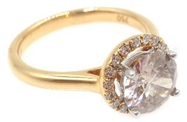 18ct rose gold diamond halo ring, stamped 750, central diamond approx 1.