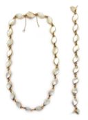 Gold mother of pearl necklace and matching bracelet,