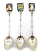 Three Japanese silver coffee spoons with bamboo hafts and satsuma ceramic terminals signed
