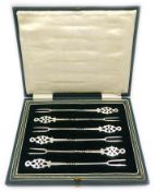 Set of six silver two prong forks with pierced terminal and twisted haft, by Roberts & Belk,