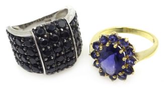 Amethyst silver gilt ring and a black stone silver buckle ring both stamped 925 Condition