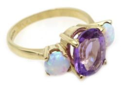 Amethyst and opal gold ring, halllmarked 9ct Condition Report Approx 3.
