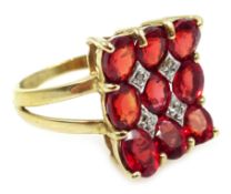 Gold garnet and diamond concave cluster ring,