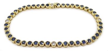 Gold bezel set sapphire and diamond line bracelet,