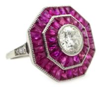 Old cut diamond and calibre cut ruby octagonal platinum (teste) target ring,
